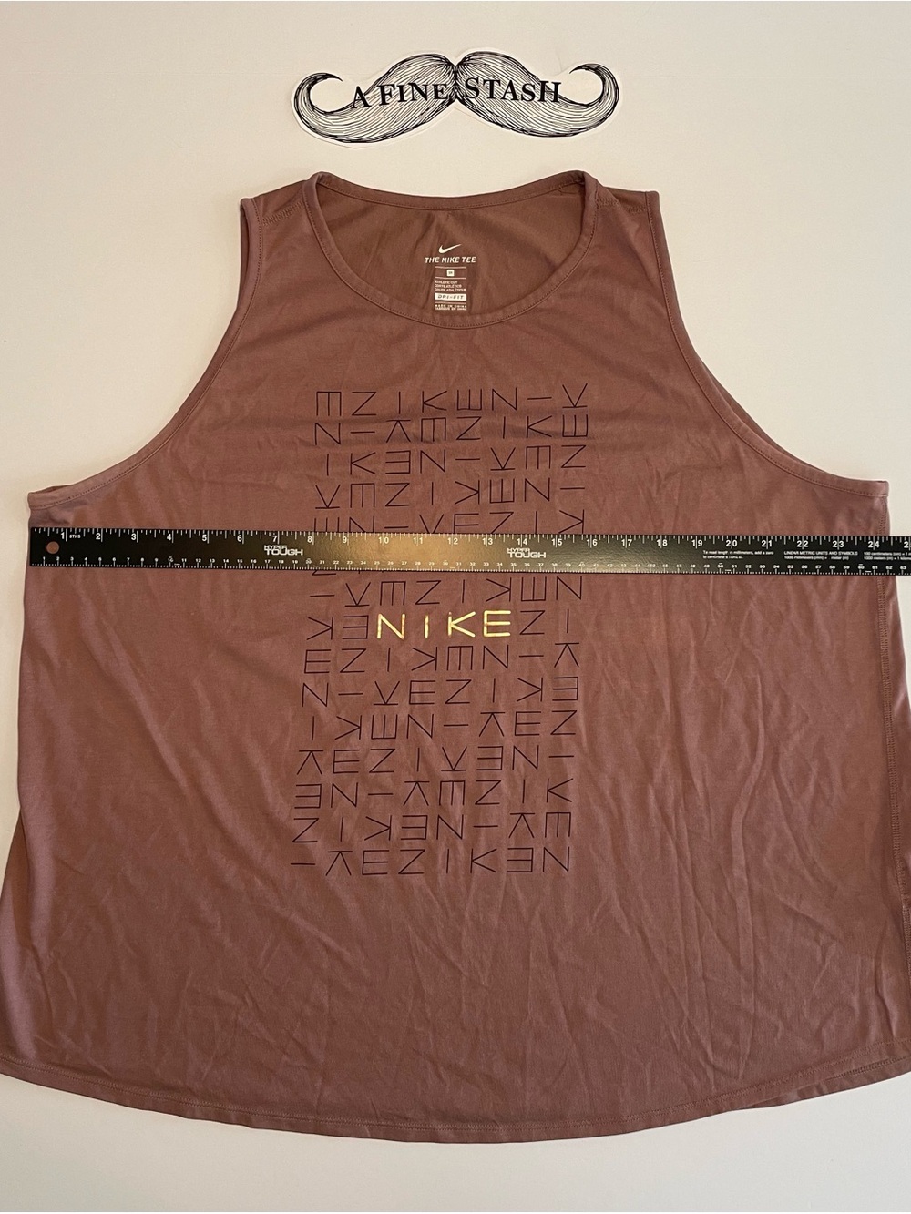 Nike mauve Graphic Women’s Tank Top with Gold word Logo